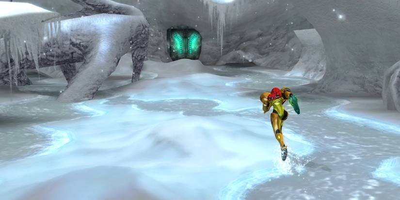 A third-person view of Samus running towards an icy cave in Metroid Other M