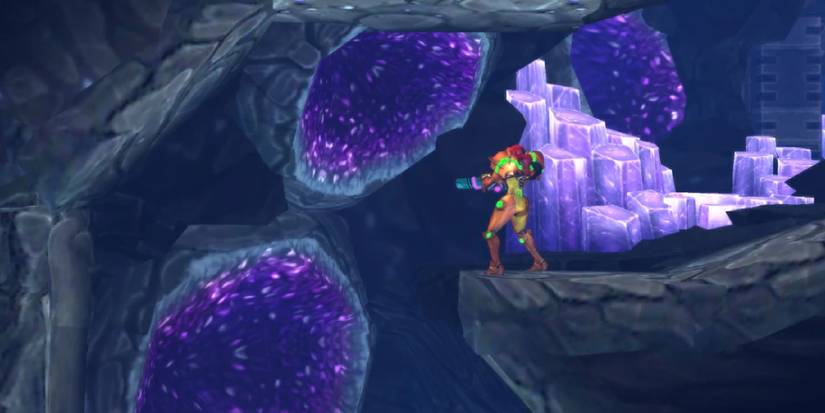Samus standing on a cliffside in Area 4 in Metroid: Samus Returns