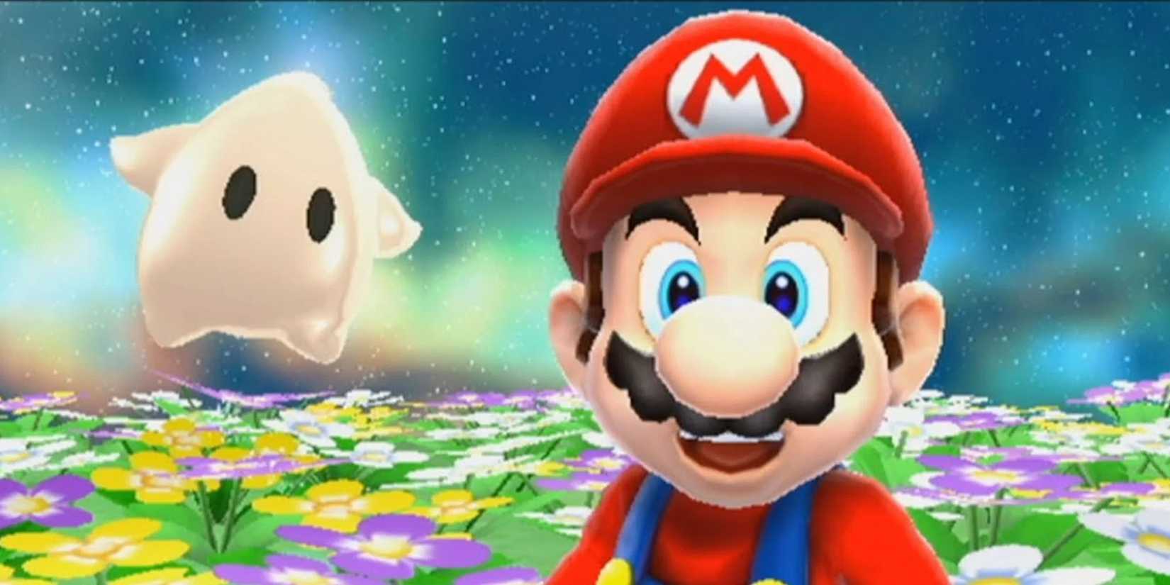 Mario staring surprised at the screen in a field of flowers with a Luma