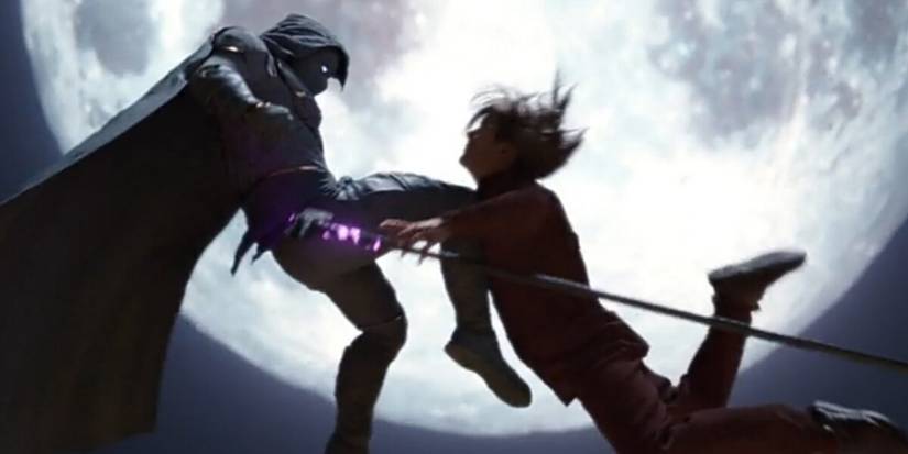 Moon Knight kicks Arthur Harrow in front of a full moon
