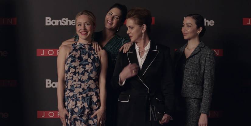 Natalie tries to get in a photo in Barry