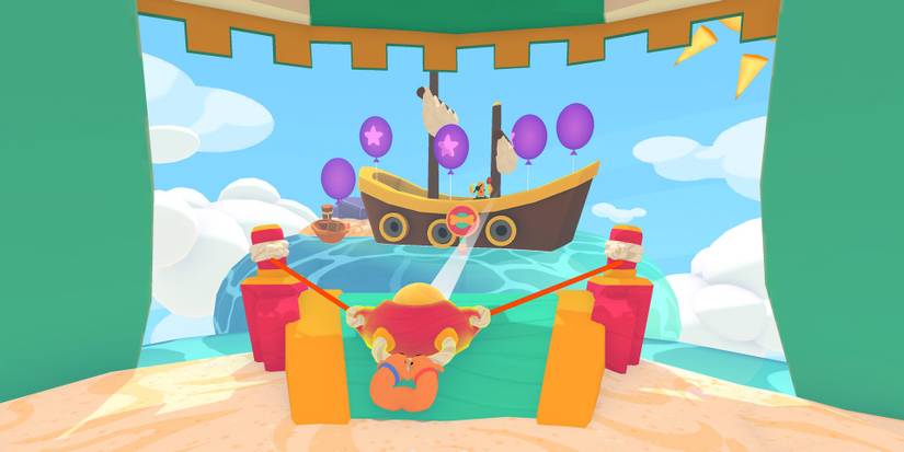 Red and Blue in PHOGS using a giant slingshot to pop balloons