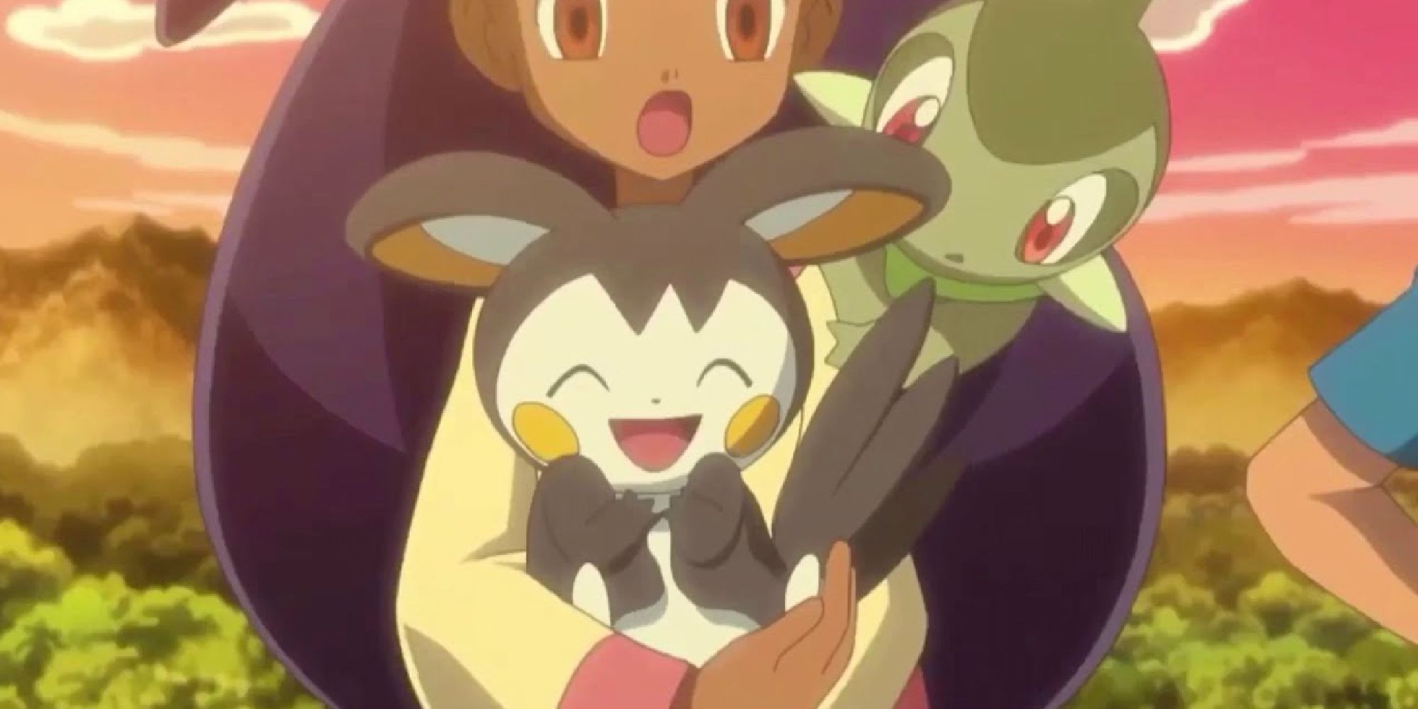 Iris holding Emolga at sunset with Axew on her shoulder