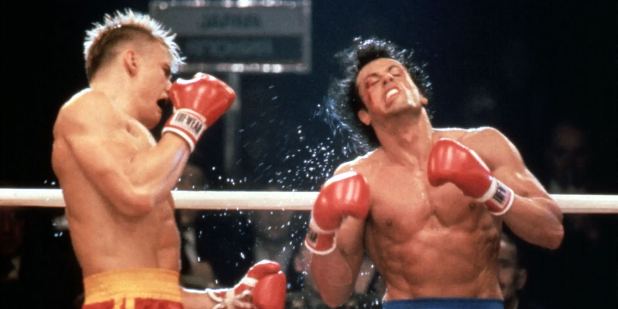 Ivan Drago punching Rocky Balboa during their match in Rocky IV