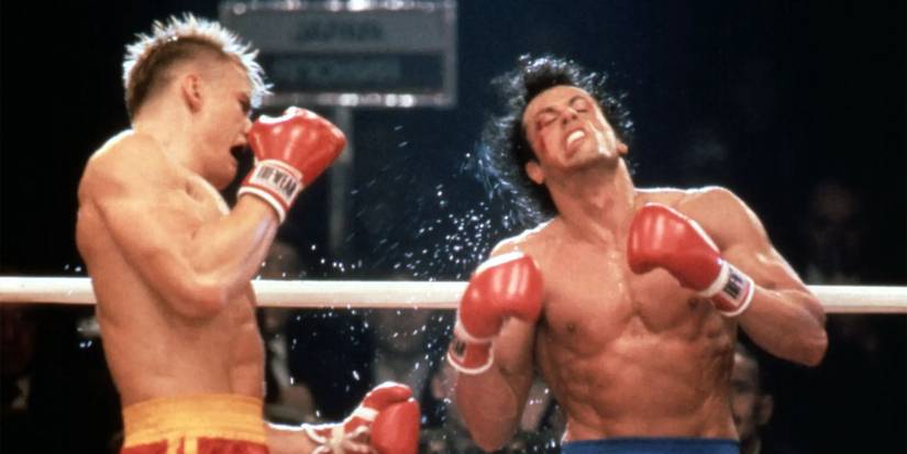 Ivan Drago punching Rocky Balboa during their match in Rocky IV