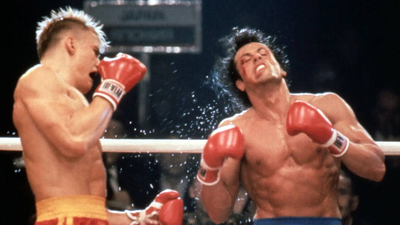 Ivan Drago punching Rocky Balboa during their match in Rocky IV