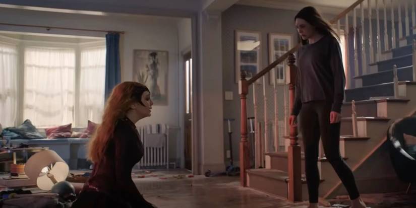 Scarlet Witch kneeling in front of Wanda