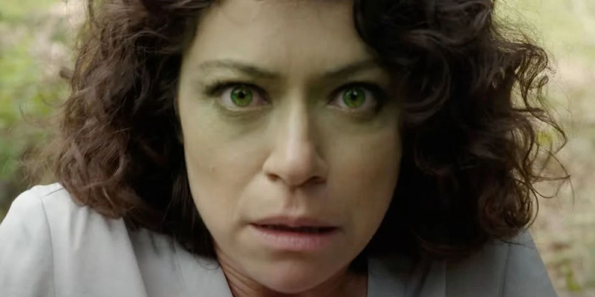 Tatiana Maslany as Jennifer Walters turning green in the She-Hulk series