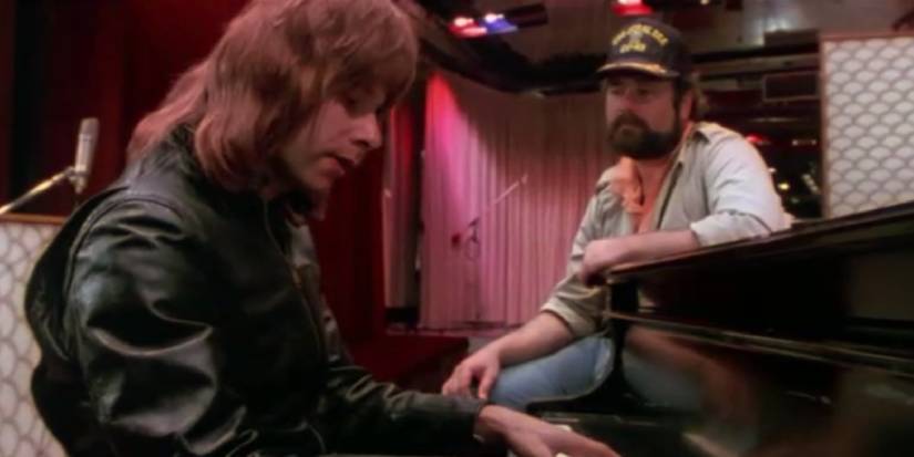 Nigel playing a classical piano composition for Marty Di Bergi