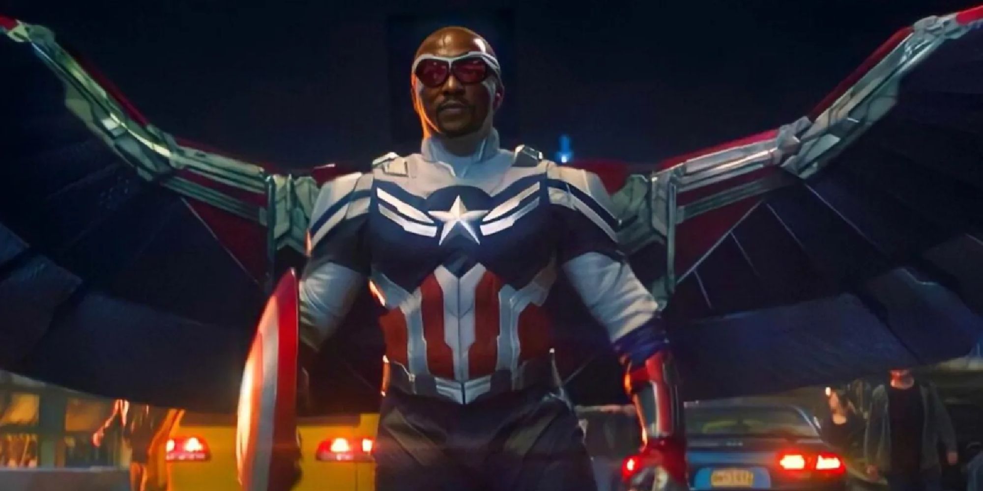 Sam Wilson in his Captain America/Falcon outfit wielding Steve's shield in The Falcon and the Winter Soldier