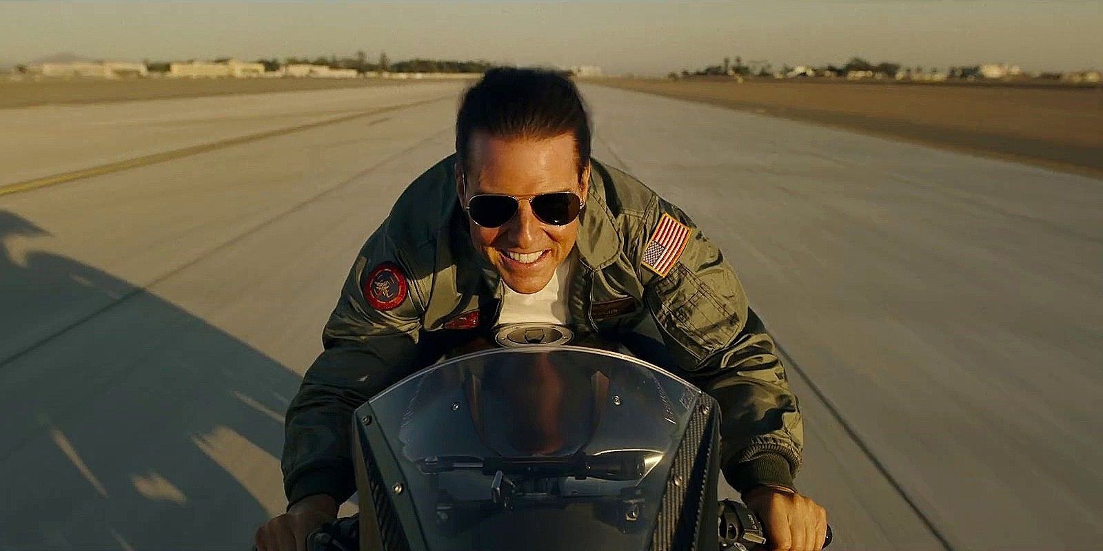Tom Cruise riding a motorcycle in Top Gun Maverick
