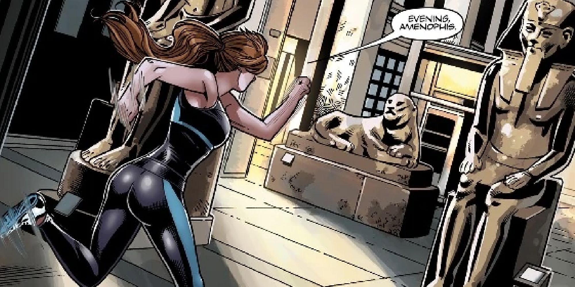 Lara races past Egyptian statues in a museum in one of the Dark Horse comic arcs