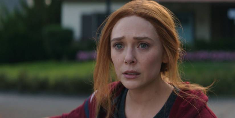 Wanda Maximoff looking frightened mid-fight in her neighborhood in WandaVision