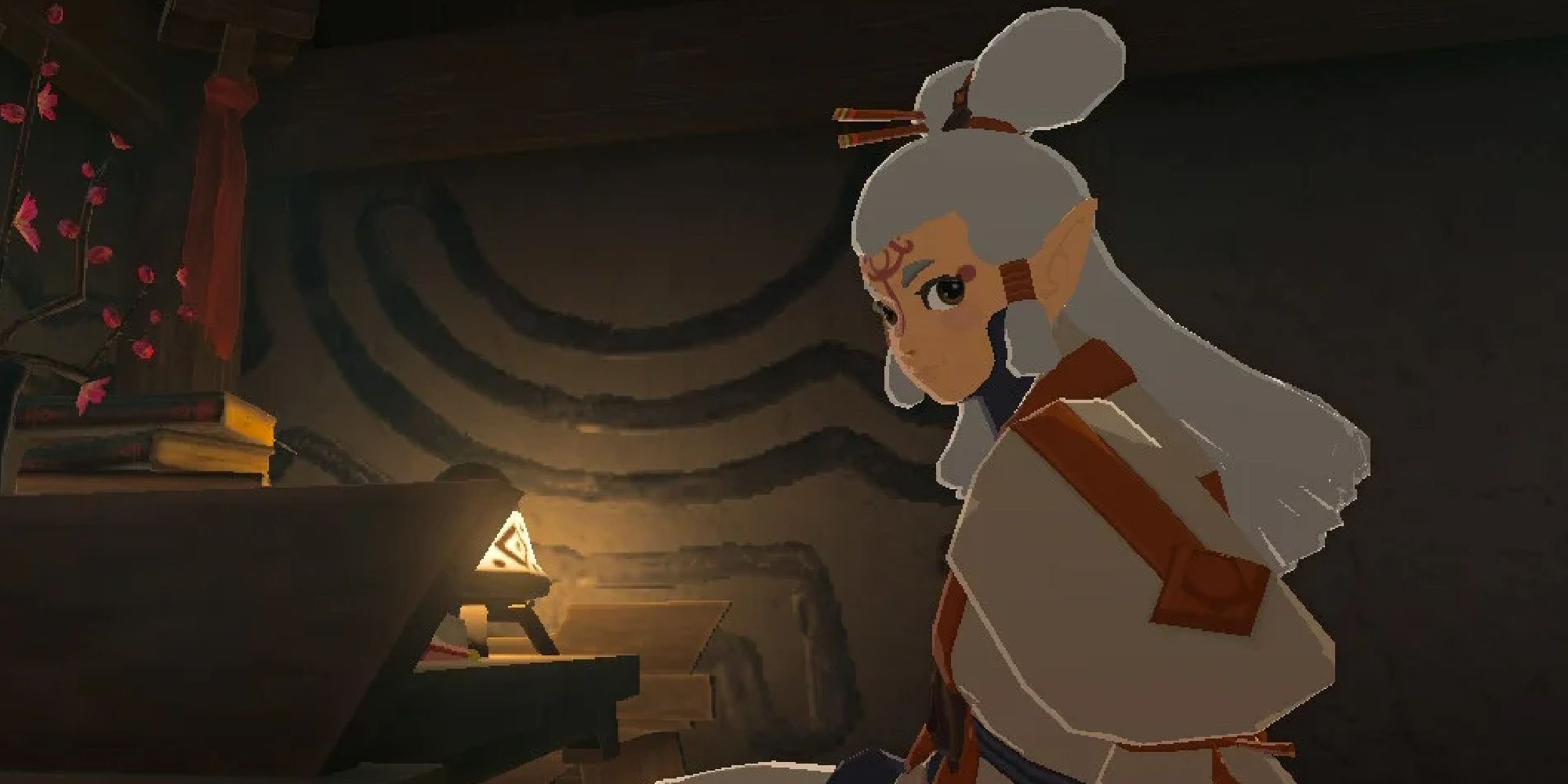 Paya looking at Link while sitting at her desk in Impa's house