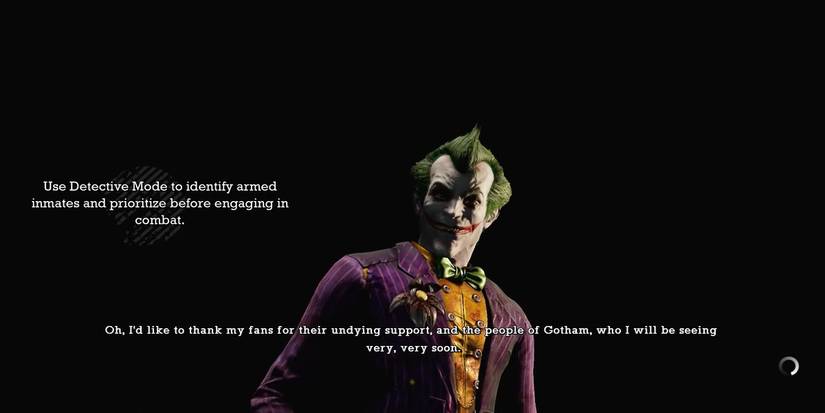 Joker mocking a dead Batman