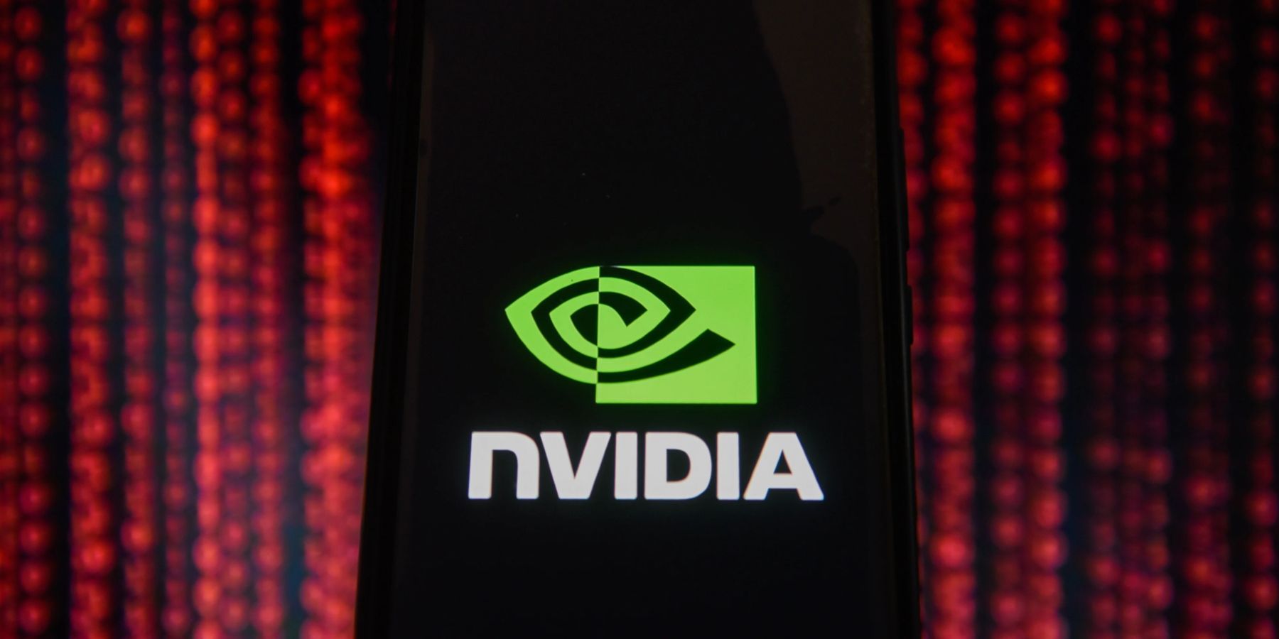 The Nvidia logo on a black and flashy red background.