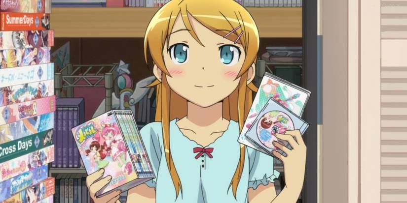 the character kirino holding her favorite video games in the anime oreimo