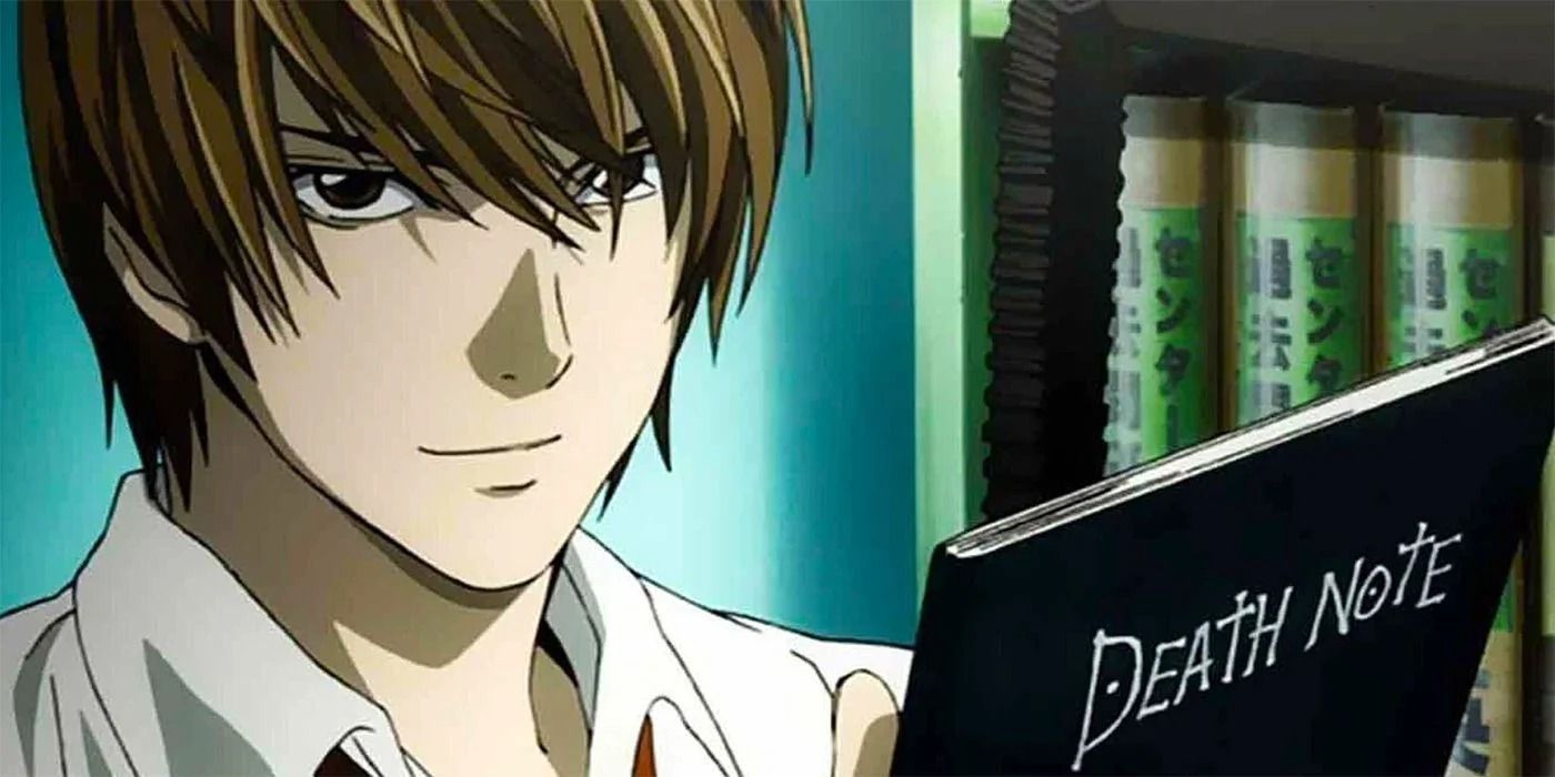 the character light yagami holding the death note book from the anime death note