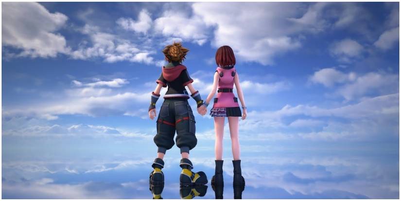Sora holding Kairi's hand.