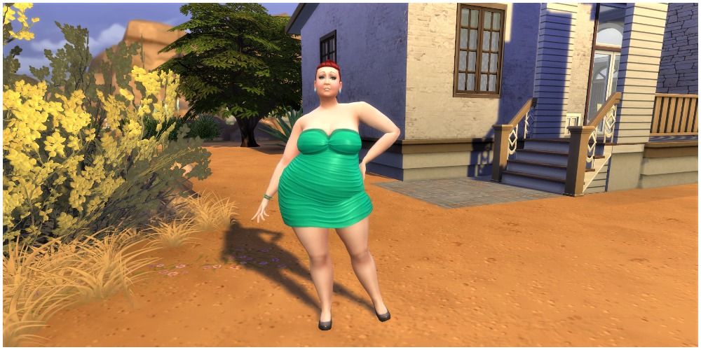 Sim in green dress.