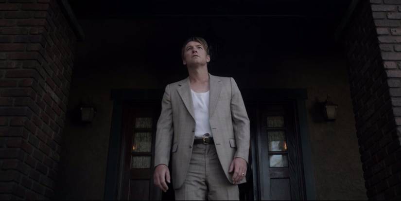 Ron Lafferty (Sam Worthington) exits house