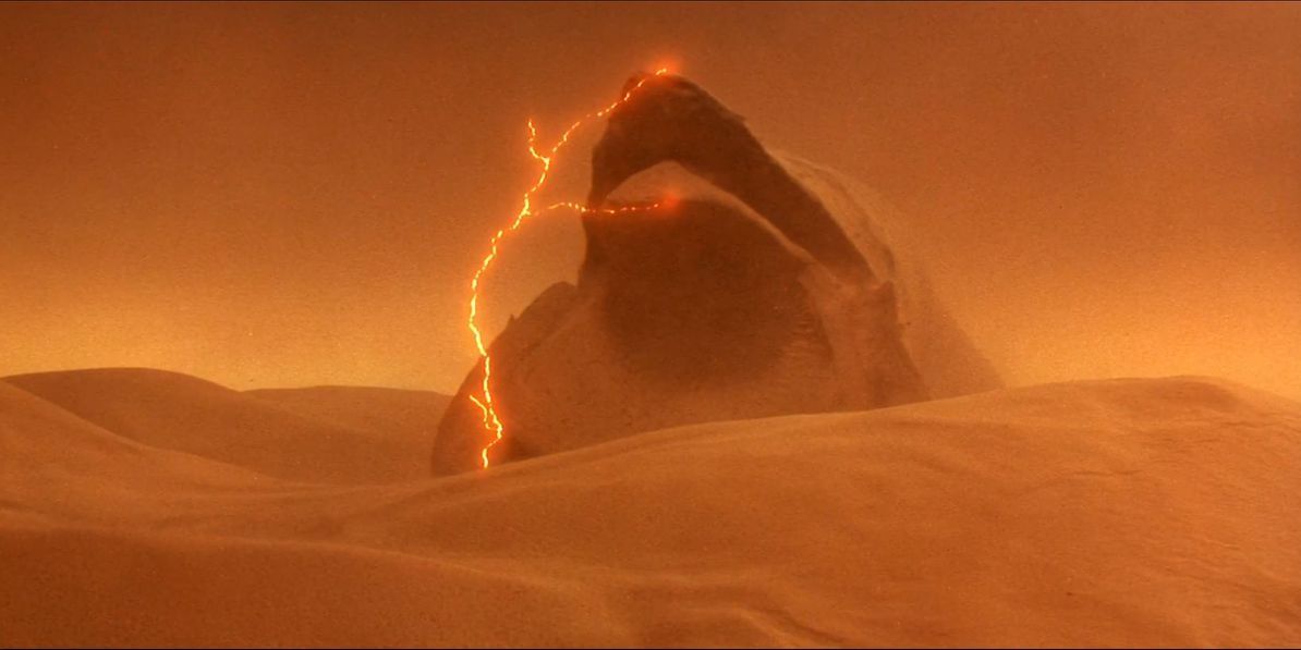 sandworm in the dunes with lightning
