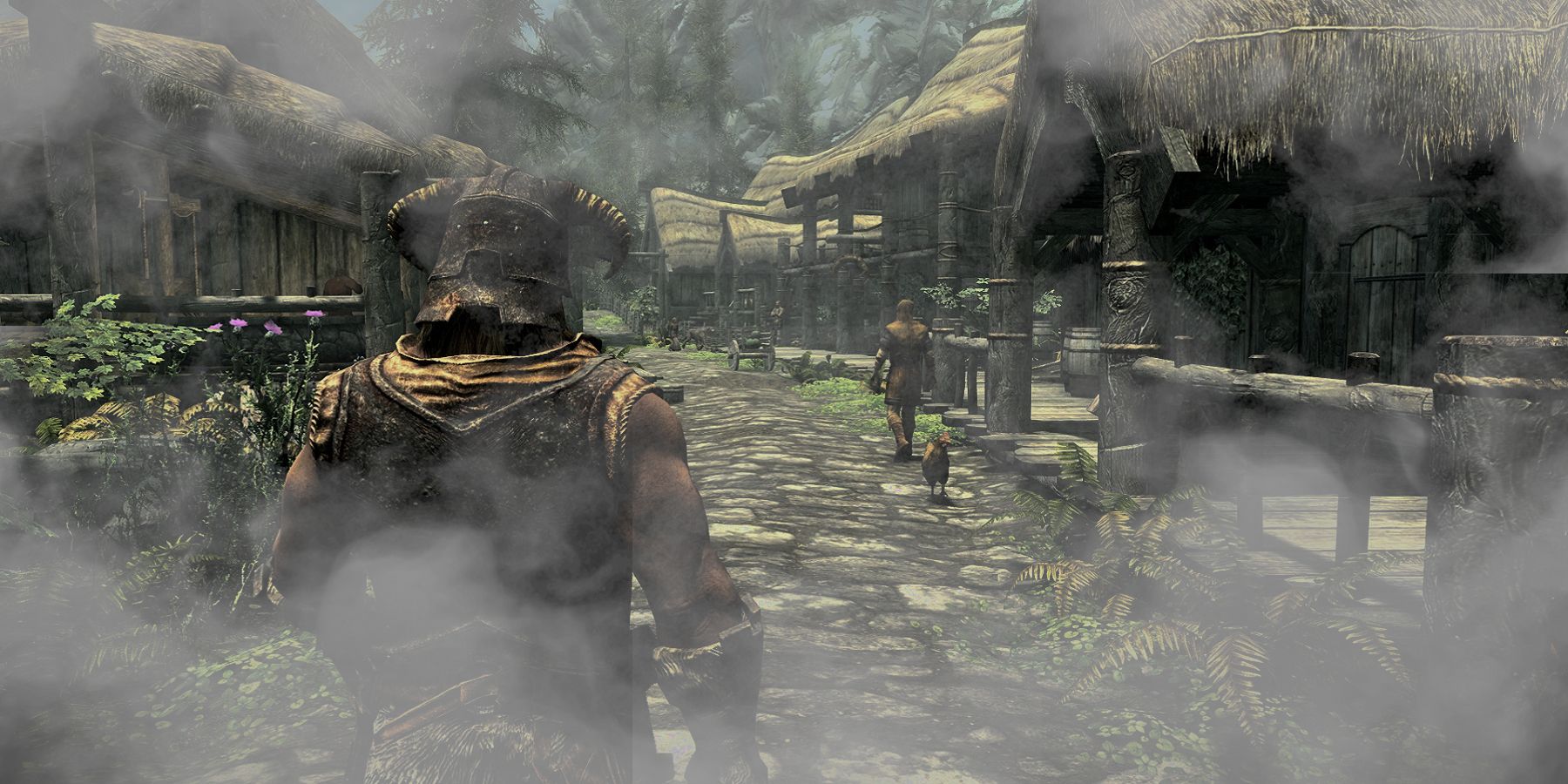 Image from The Elder Scrolls 5: Skyrim showing the player walking through a very foggy Whiterun.