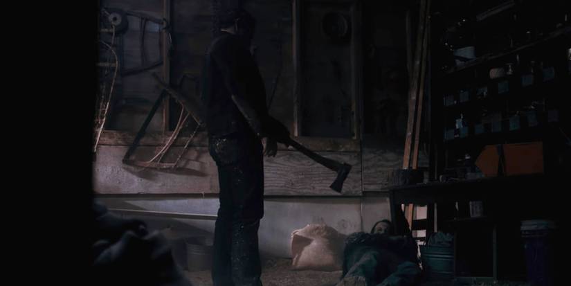 Lalo Salamanca with Ax in dark shed  Better Call Saul