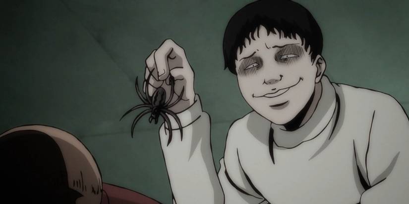 souichii tsuijii with fake spider and voodoo doll