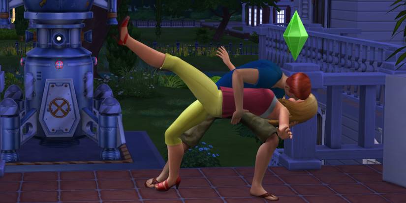 Two Sims kissing in The Sims 4