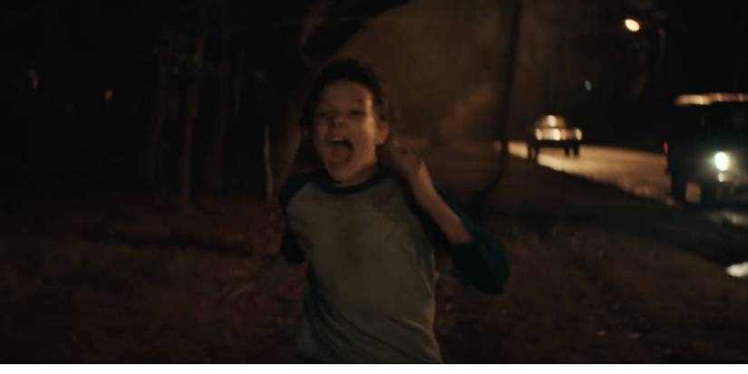 Finney running from The Grabber from The Black Phone