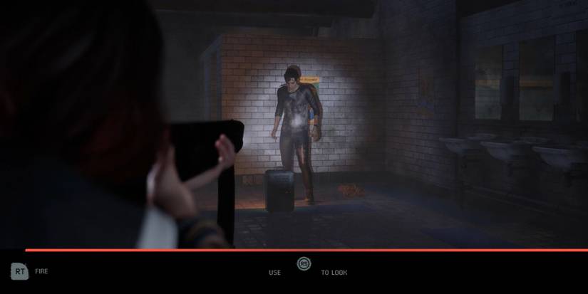 Abigail aiming at nick in the quarry