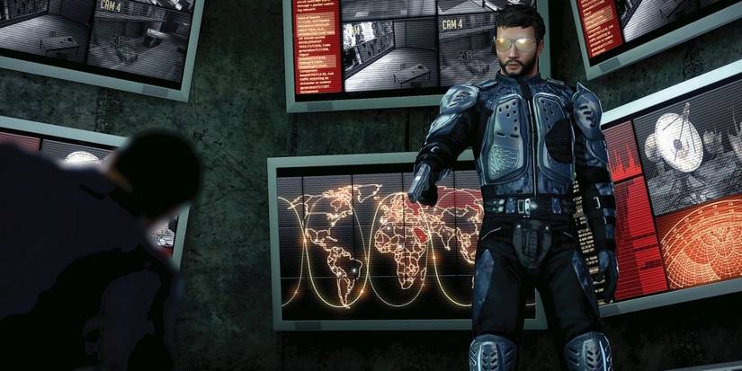 Man aiming gun at a man on the ground in Alpha Protocol