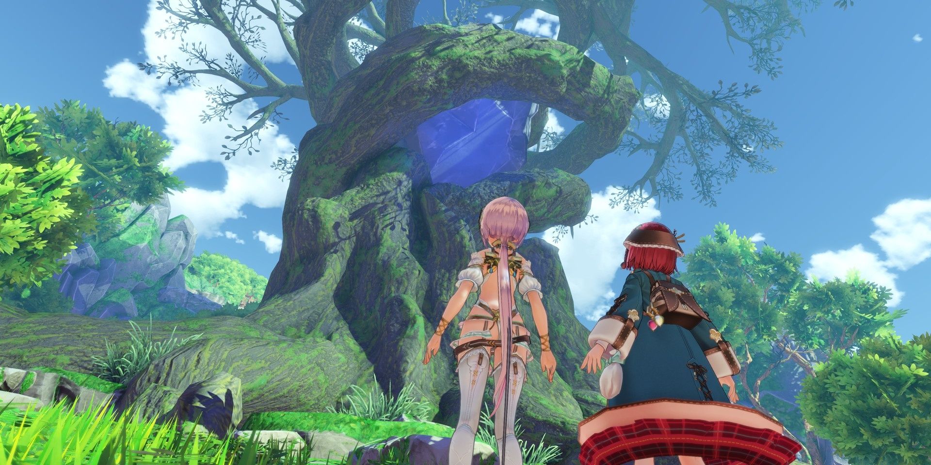 Two characters looking at a massive landmark in Atelier Sophie 2