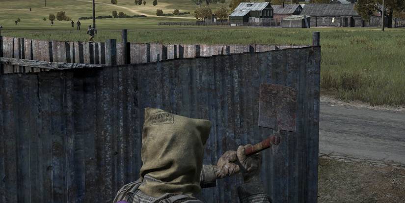 Player using the Farming Hoe in DayZ .