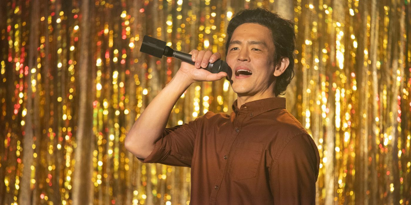 Don't Make Me Go production still of John Cho singing at karaoke