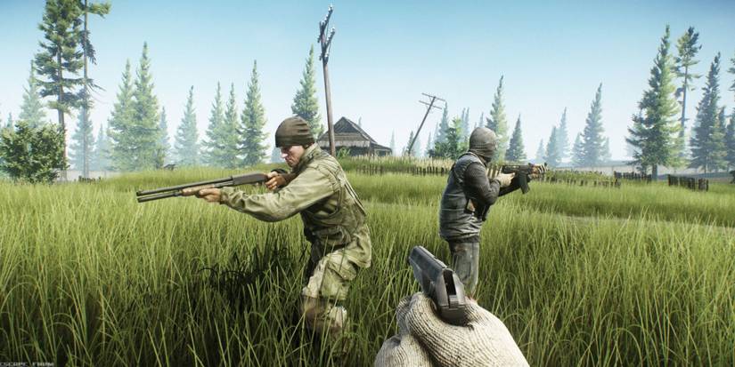 Scav characters explore a forest in Escape From Tarkov