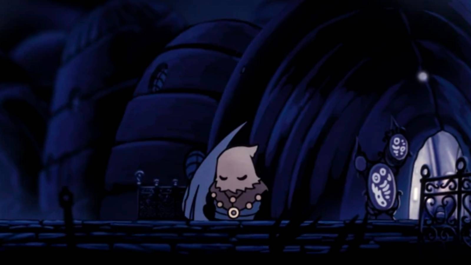 Hollow Knight Cloth sleeping outside Sly's shop in Dirtmouth