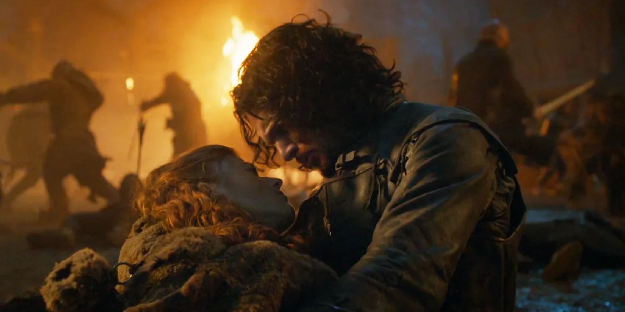 Jon Snow holding Ygritte in his arms during the Battle of Castle Black