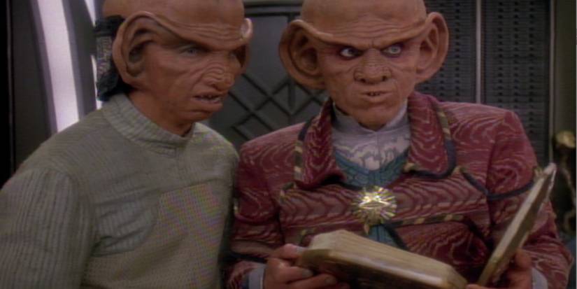 Rom (Max Grodénchik) (left) and Quark (Armin Shimerman) reading from the revised Rules of Acquisition. Image Source: ParamountPlus.com