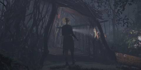 Laura standing near a big cage in the quarry