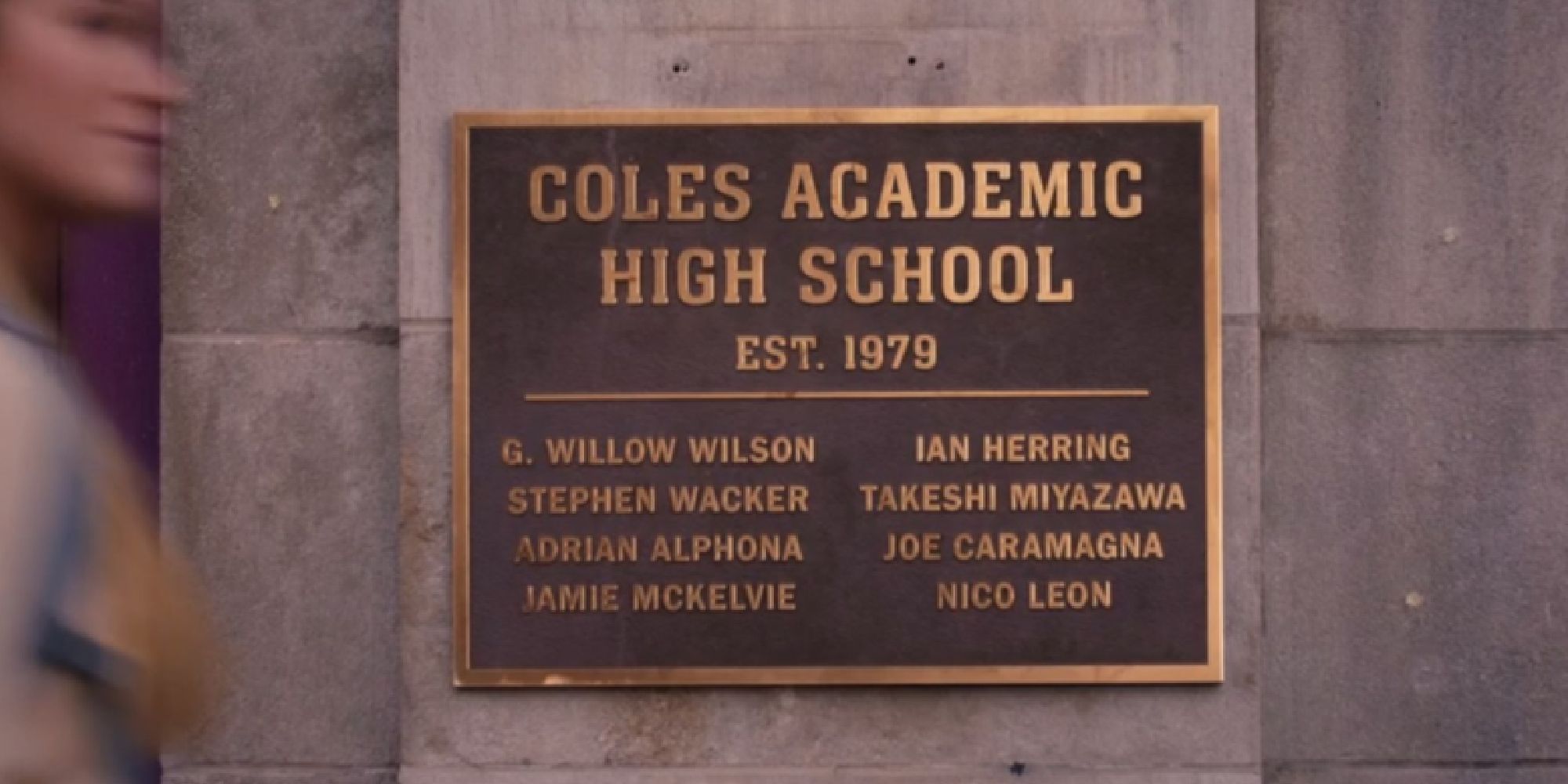 The plaque on Kamala Khan's high school showing the creators of the character