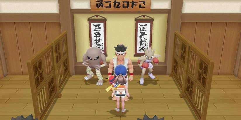 Player choosing between Hitmonlee and Hitmonchan in Pokemon Let's Go