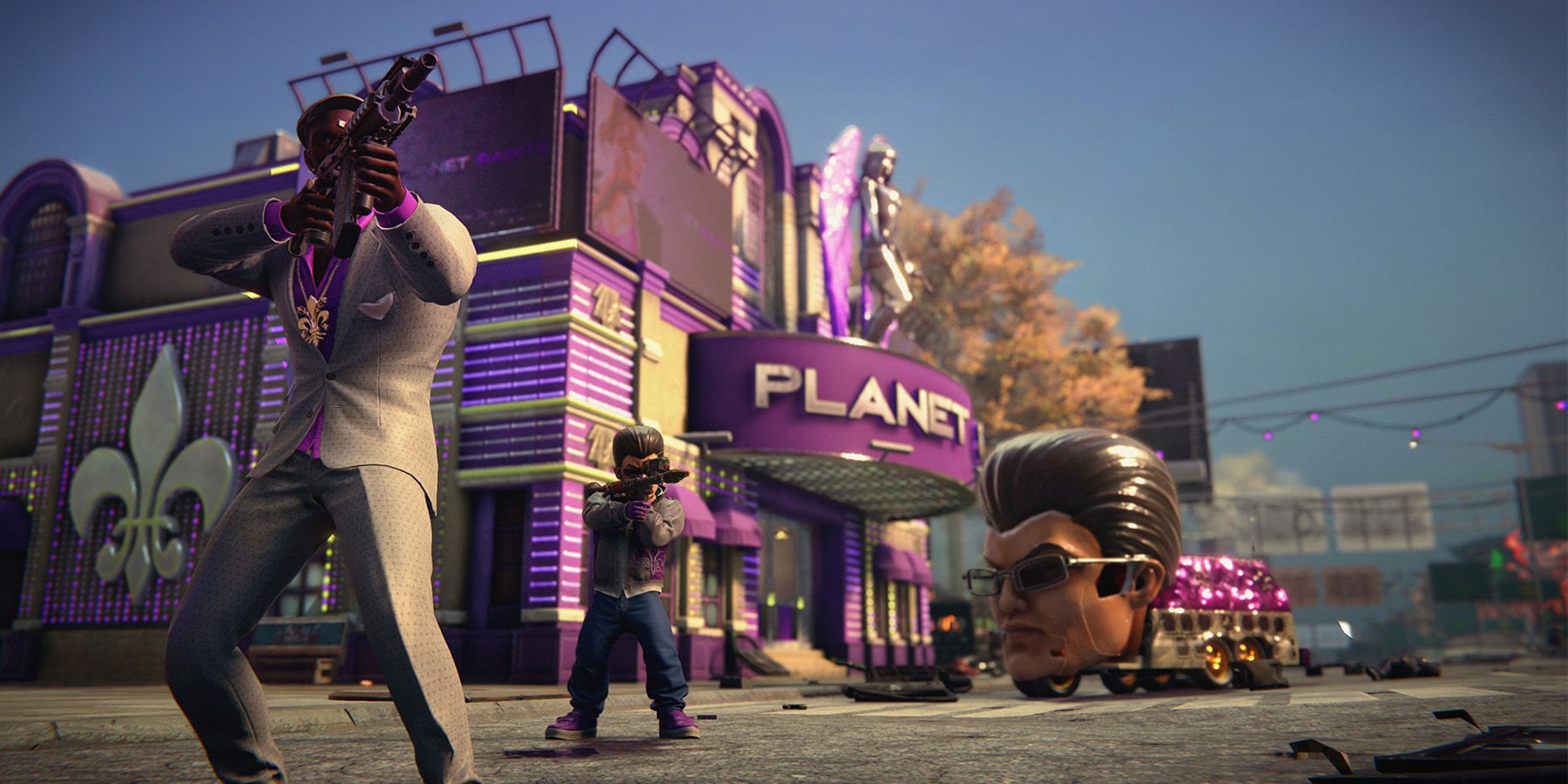 Two characters aiming weapons on a street in Saints Row: The Third