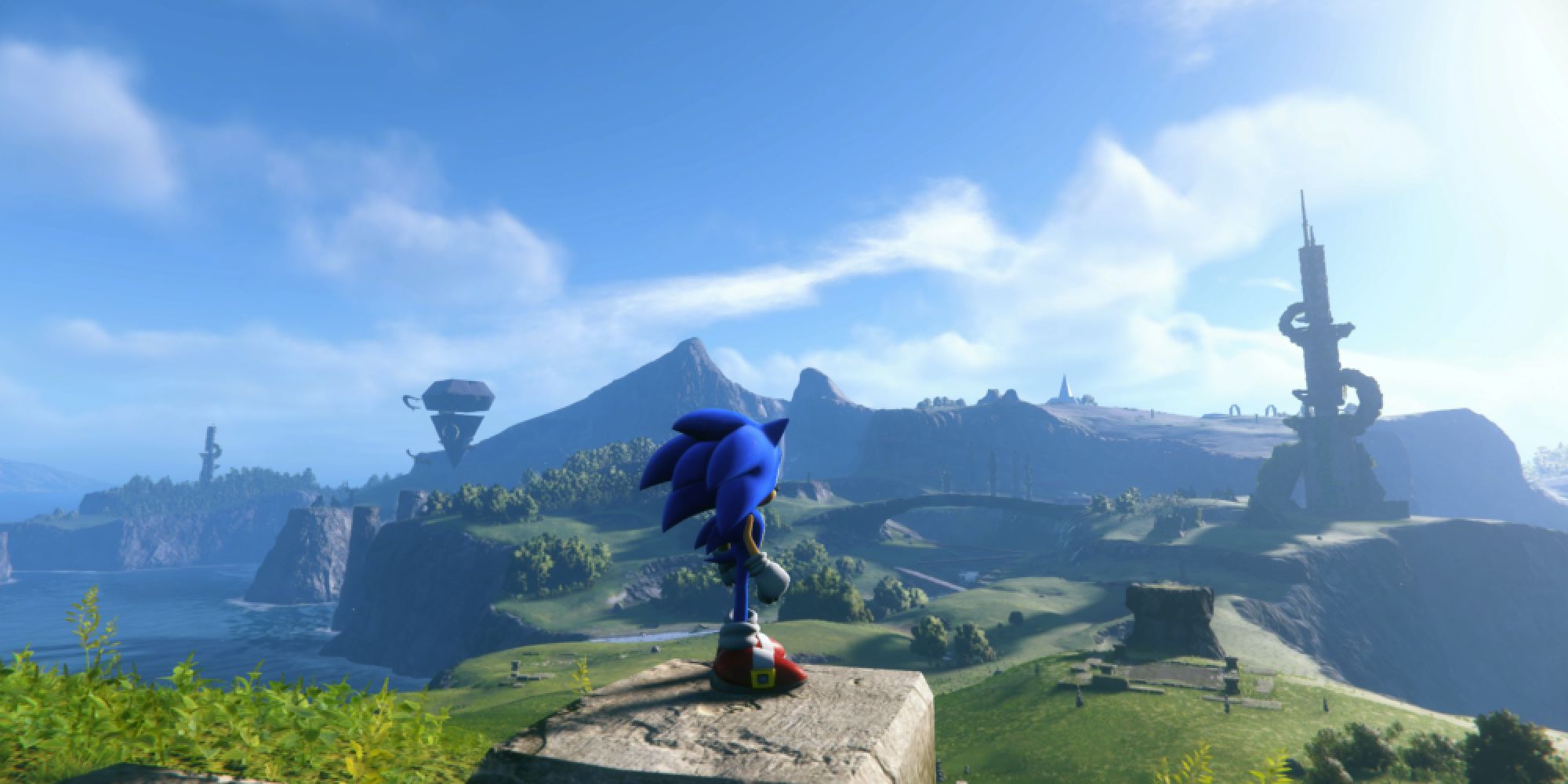 Соник стоит у скалы и смотрит на открытый мир в трейлере Sonic Frontiers.