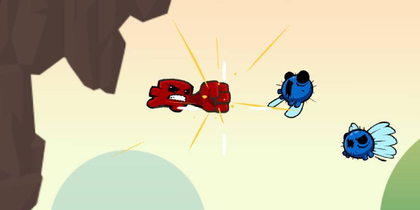 Super Meat Boy punching a flying enemy in Super Meat Boy Forever