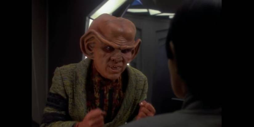 Quark (Armin Shimerman) (left) explains to Sakonna (Bertila Damas) (right), facing away from the camera. Image source: Terrence Smith