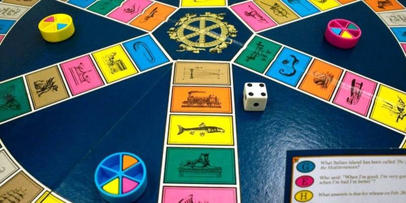 Trivial Pursuit baord with die and pies