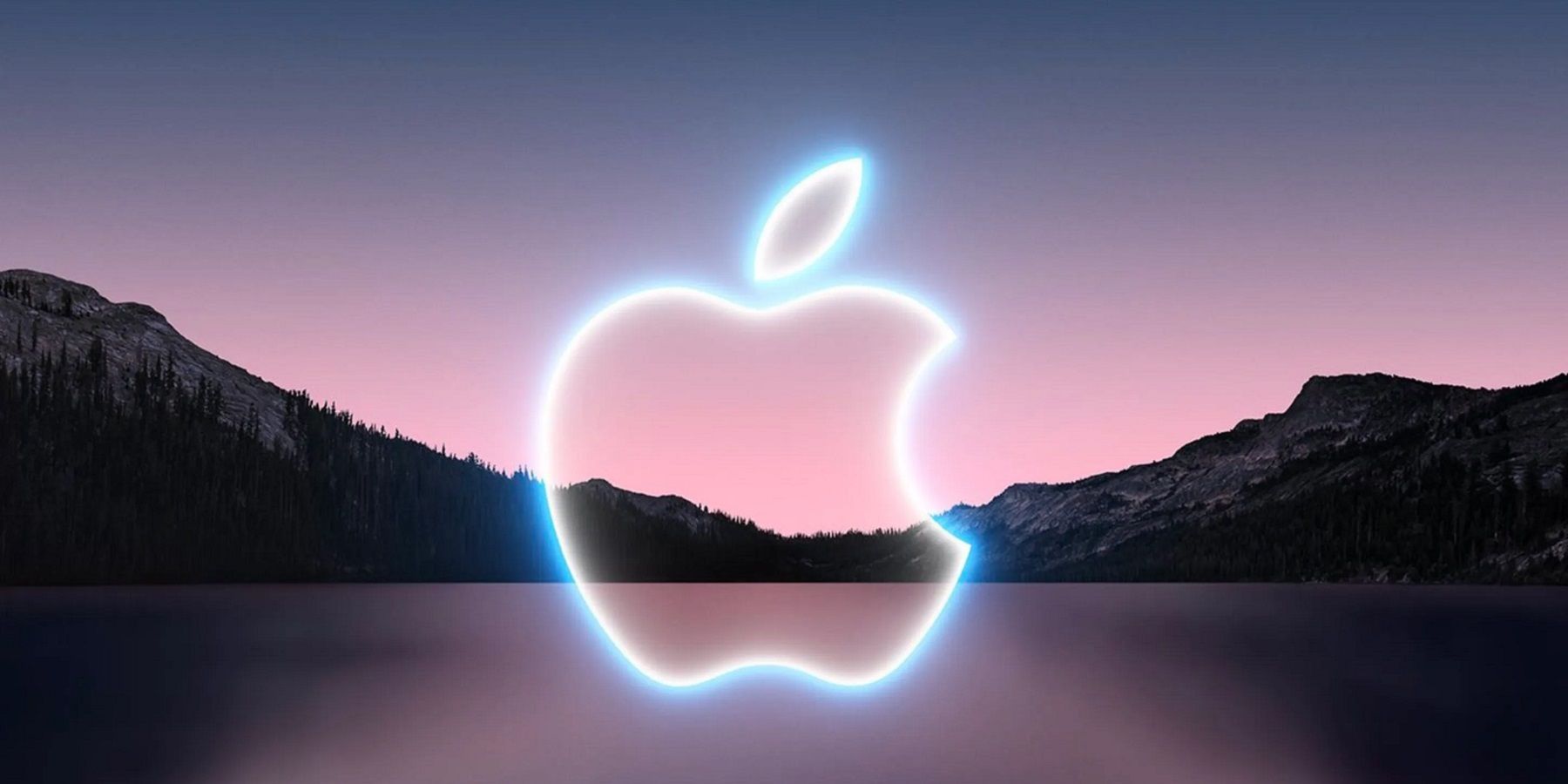 Изображение логотипа Apple на фоне гор.