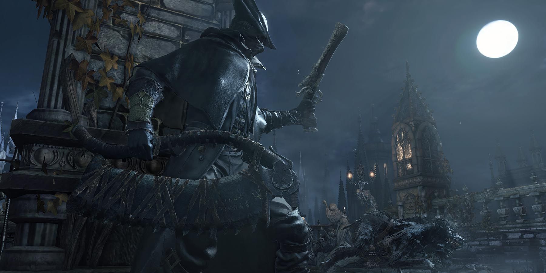 The Hunter looking toward buildings during the night in Bloodborne